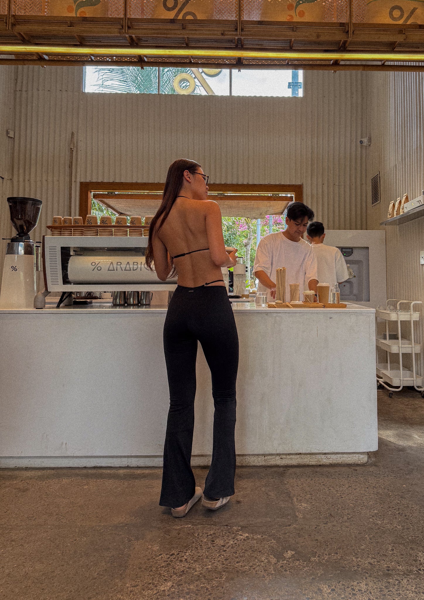 Momentum Wrap Flare Pants In Black