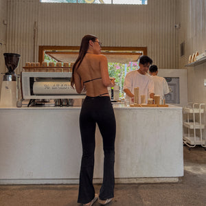 Momentum Wrap Flare Pants In Black